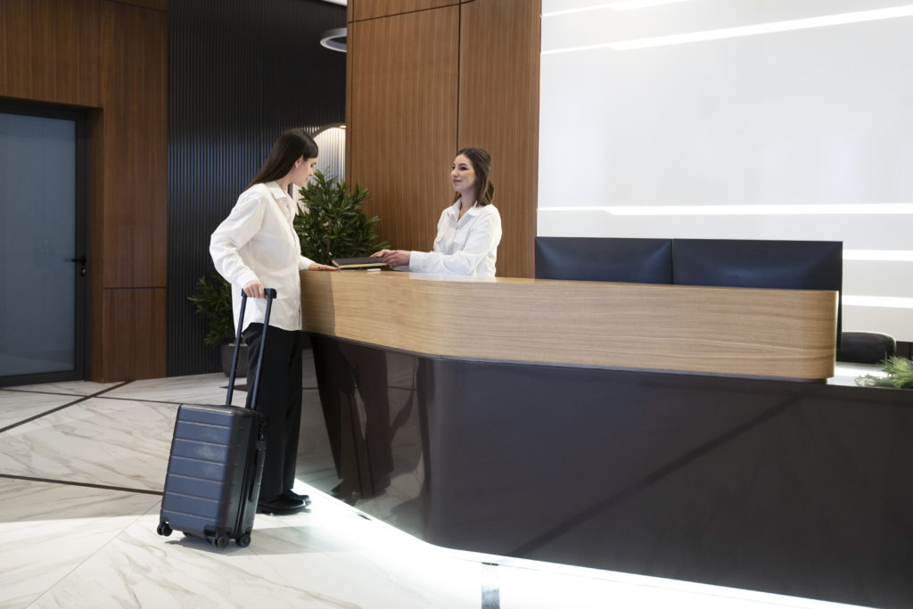 receptionist talking to a customer